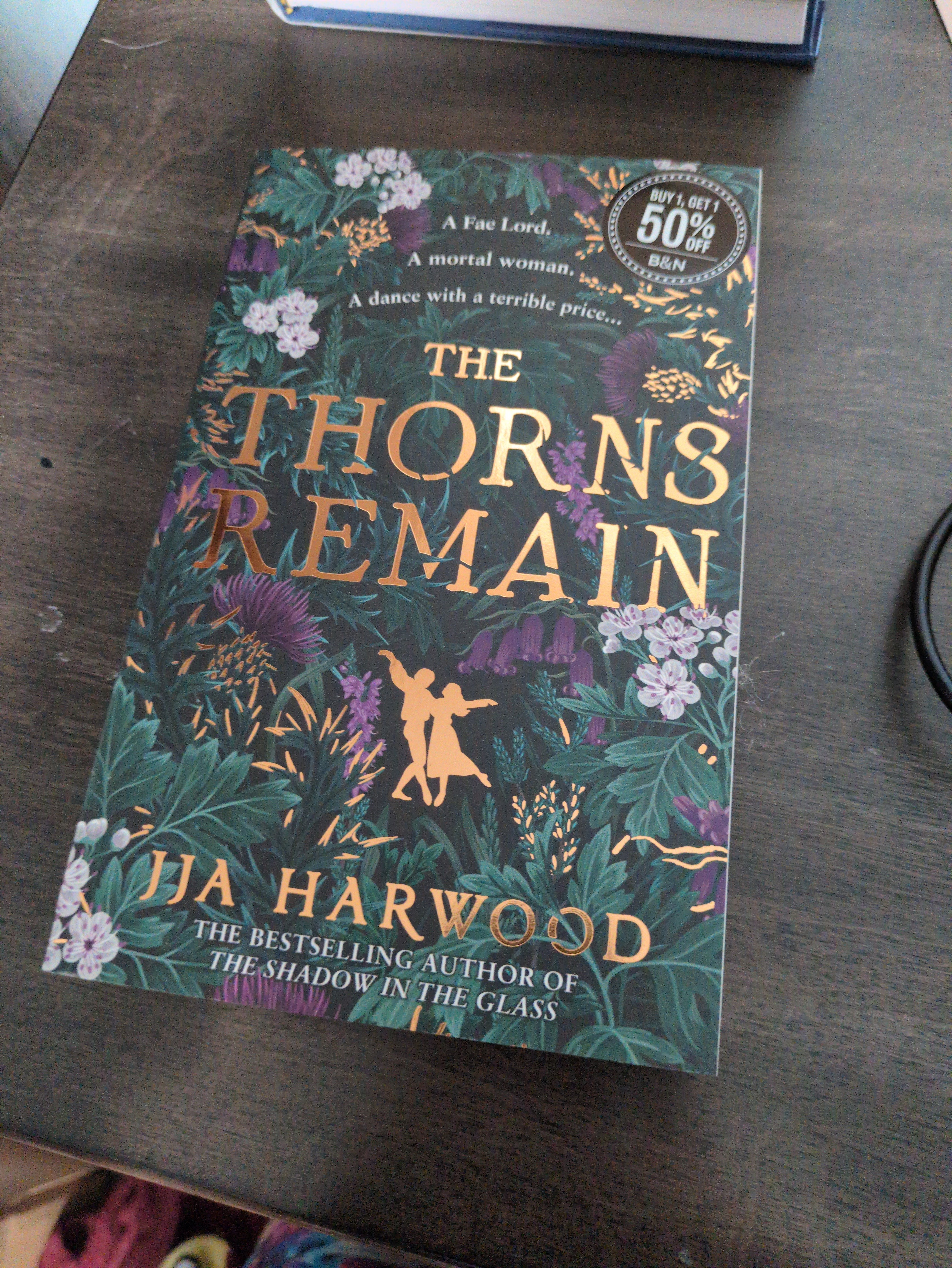 Cover of The Thorns Remain